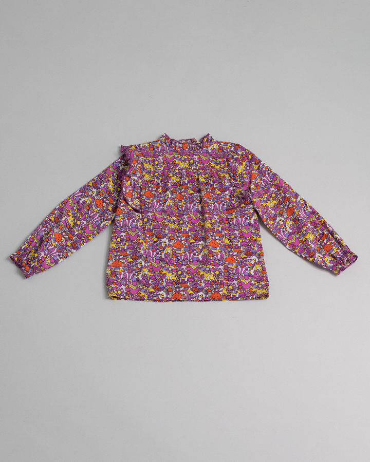 Blusa con estampado de hongos y volantes