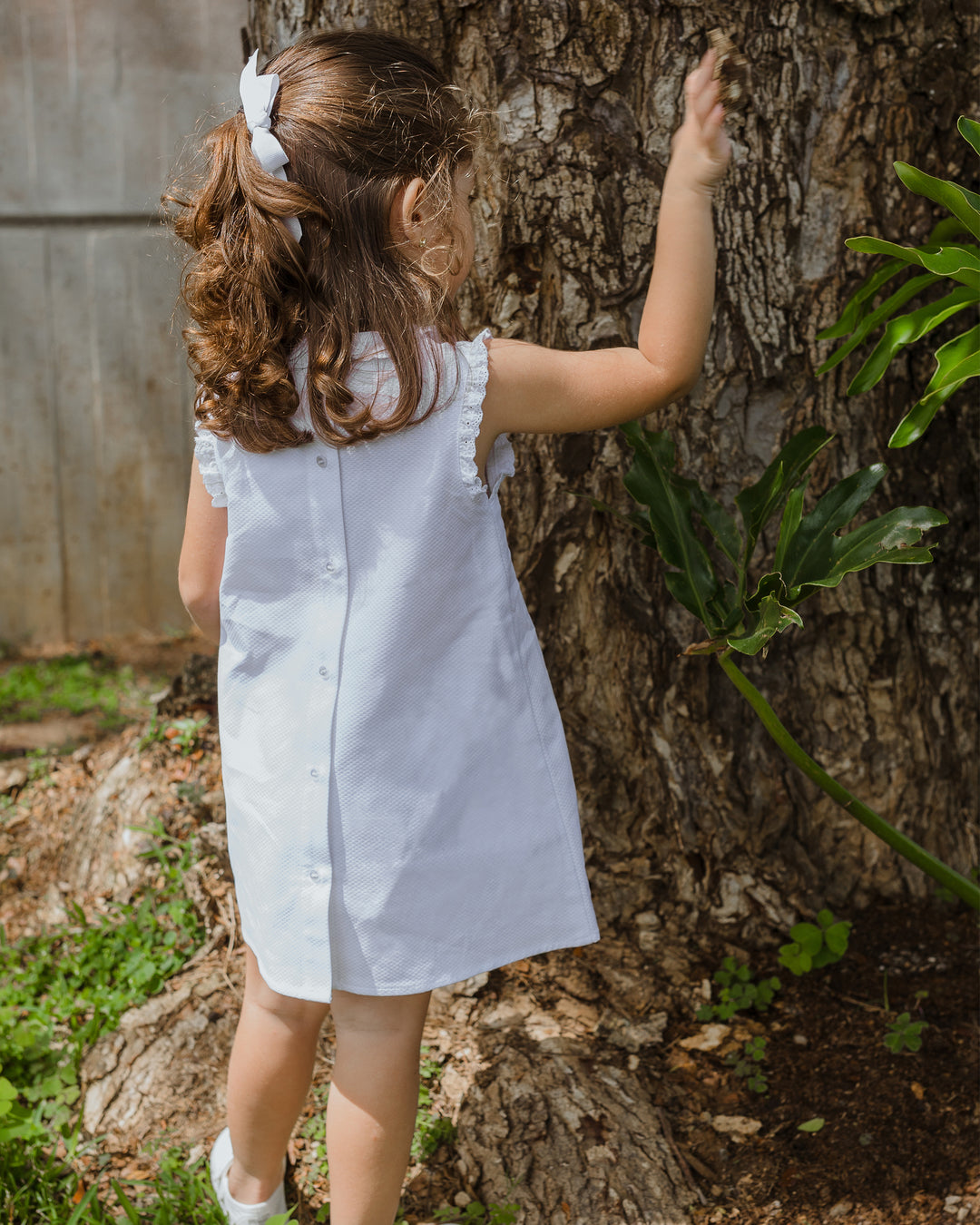 Vestido blanco piquet con flores bordadas en blanco