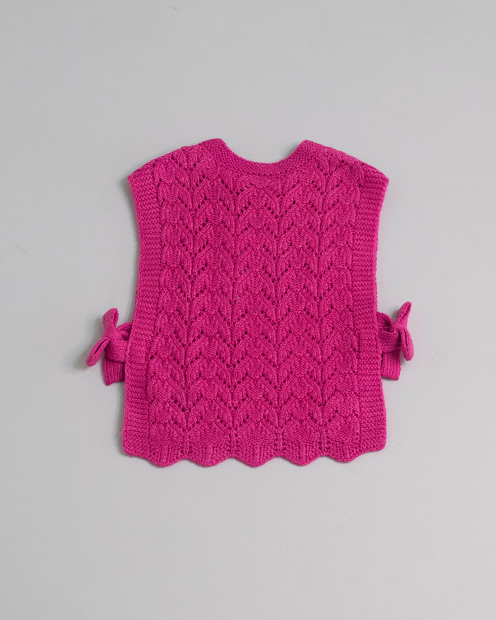 Chaleco fucsia con lazos a los lados