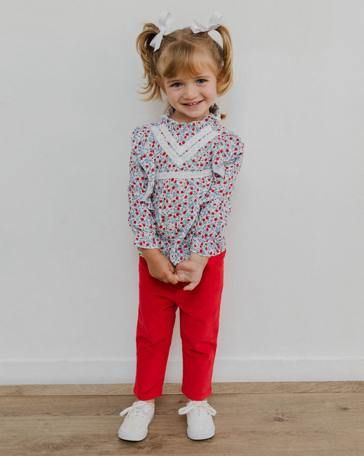 Blusa con estampado floral y volantes