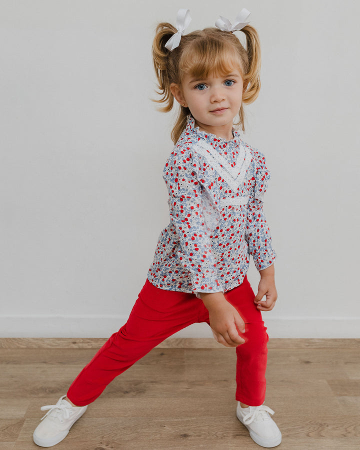 Blusa con estampado floral y volantes