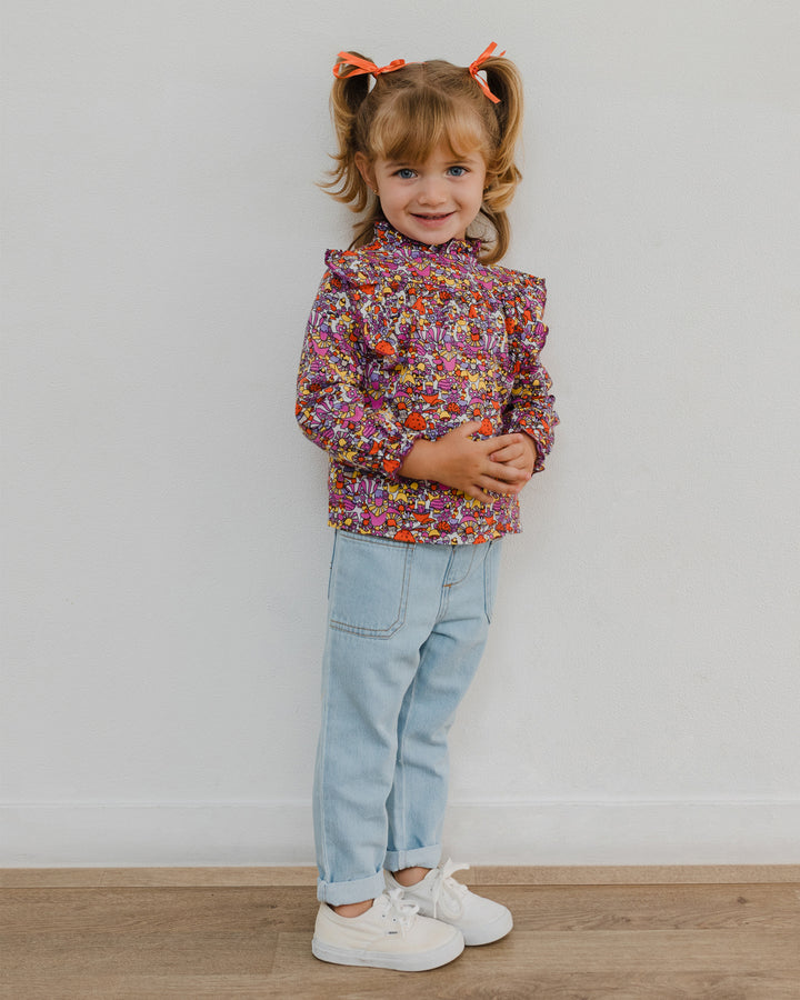 Blusa con estampado de hongos y volantes