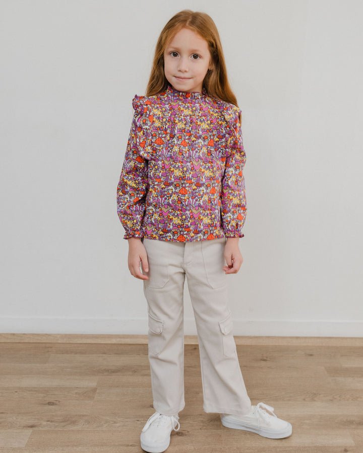 Blusa con estampado de hongos y volantes