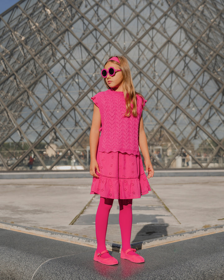 Chaleco fucsia con lazos a los lados