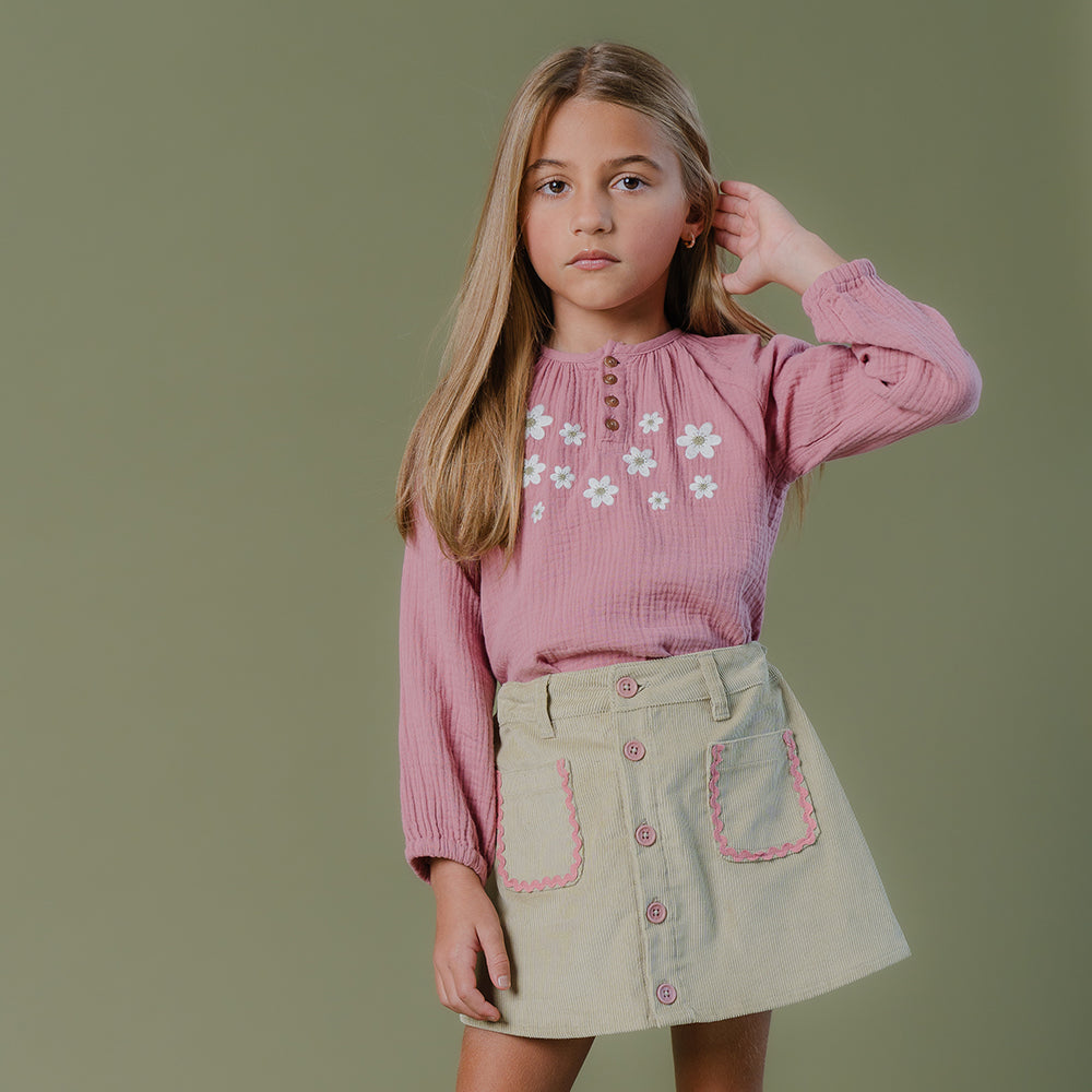 Falda Verde de Corduroy con Botones y detalles en Bolsillo Rosados para Niña