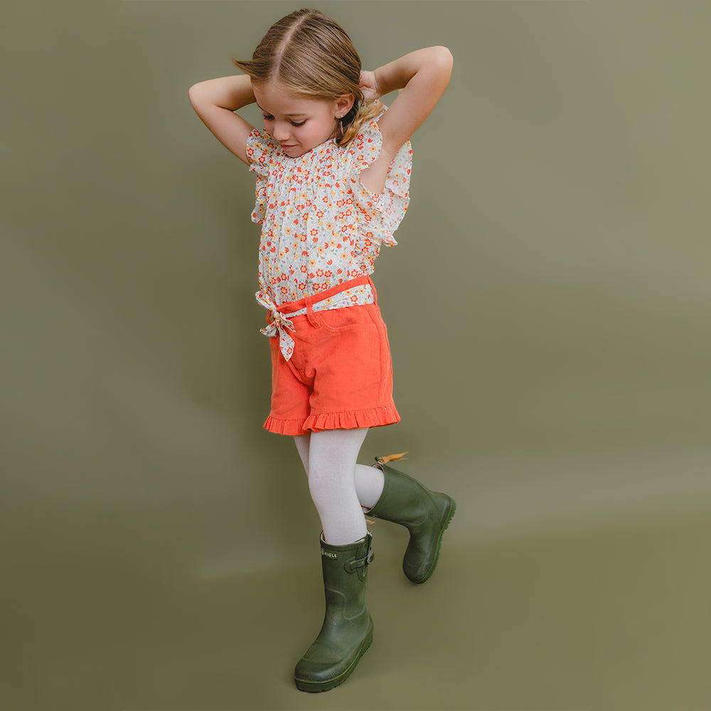 Short Anaranjado de Corduroy con Cinturón Estampado para Niña
