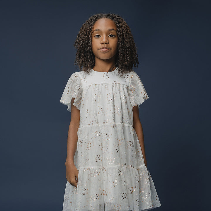 Vestido De Tela Ligera Crema Con Estampado De Estrellas Doradas Metálicas Para Niña