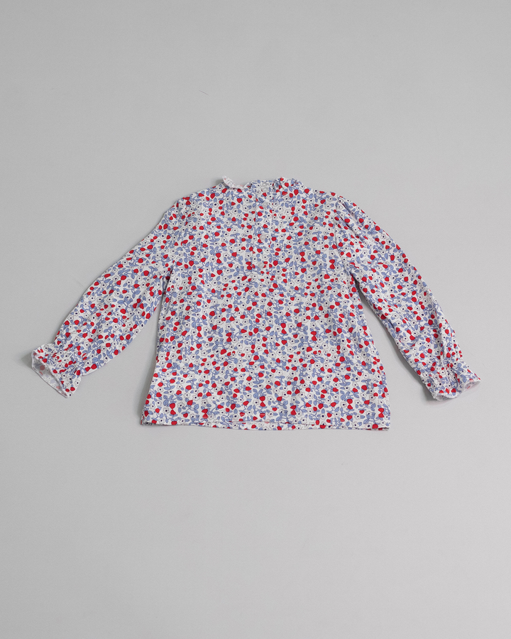 Blusa con estampado floral y volantes