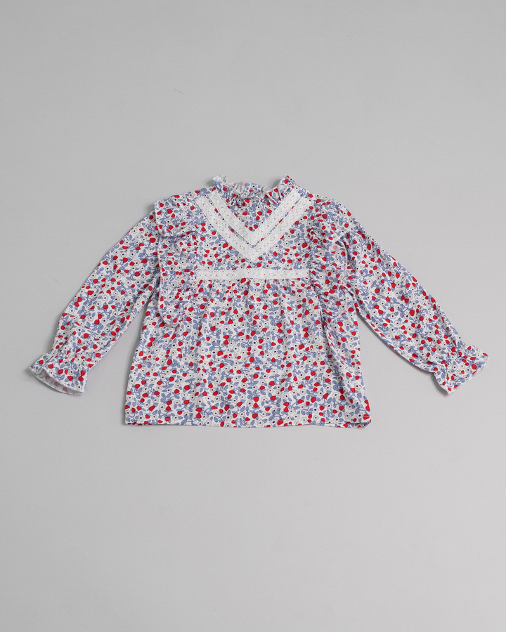 Blusa con estampado floral y volantes