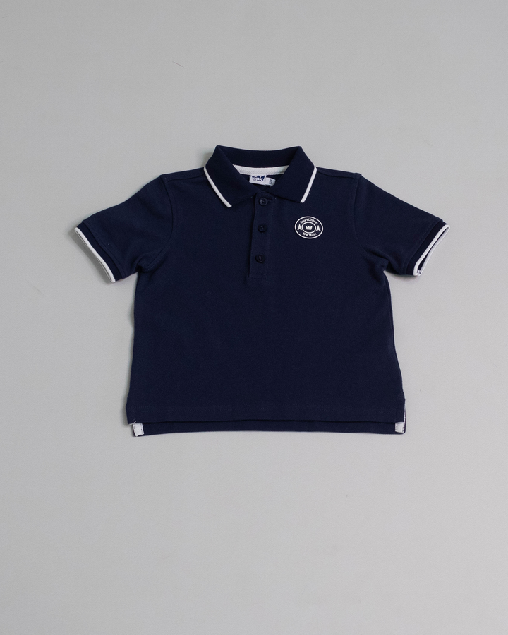 Chemise con parche de goma