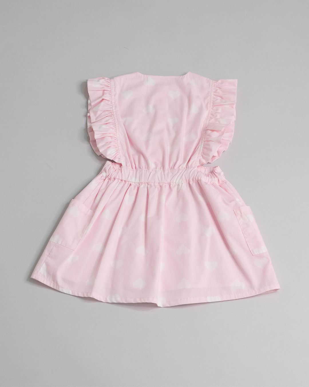 Vestido Rosado de popelina de corazones con bolsillos