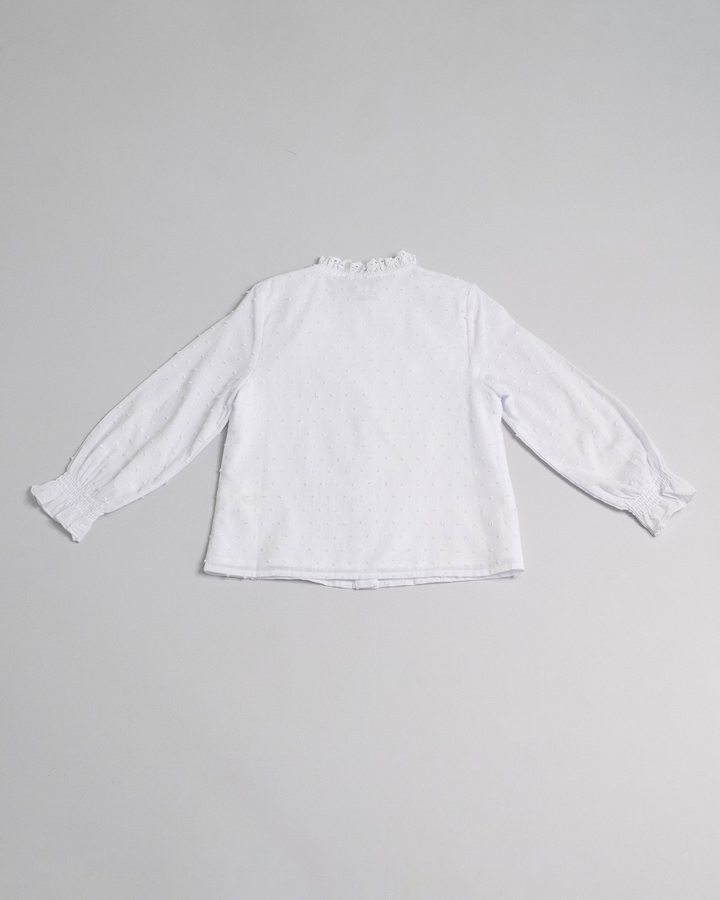 Blusa de plumetti con ojetes en volantes en la parte de adelante, Blanco