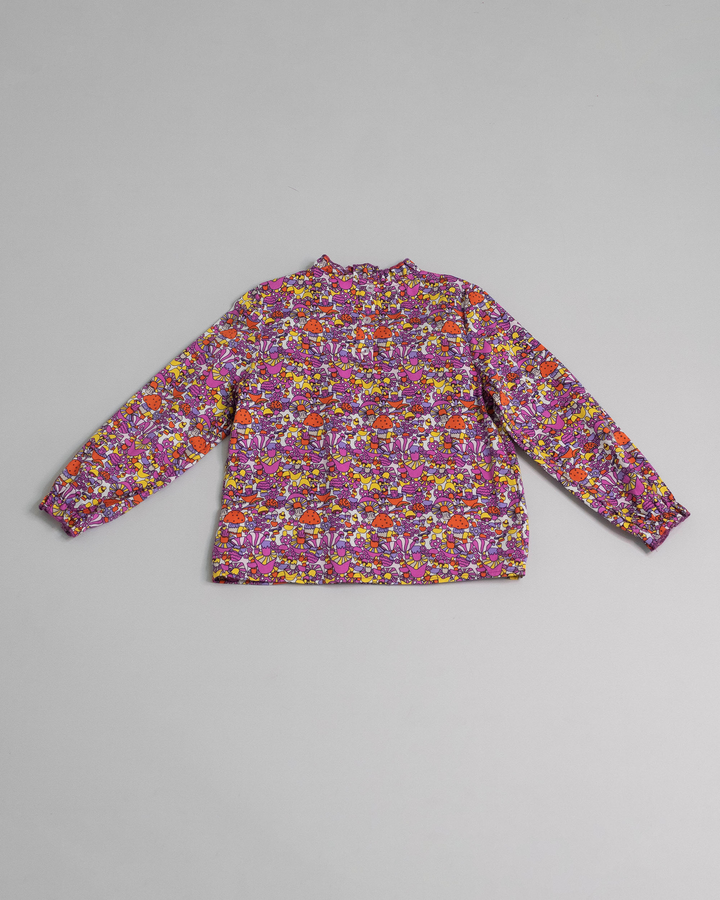 Blusa con estampado de hongos y volantes