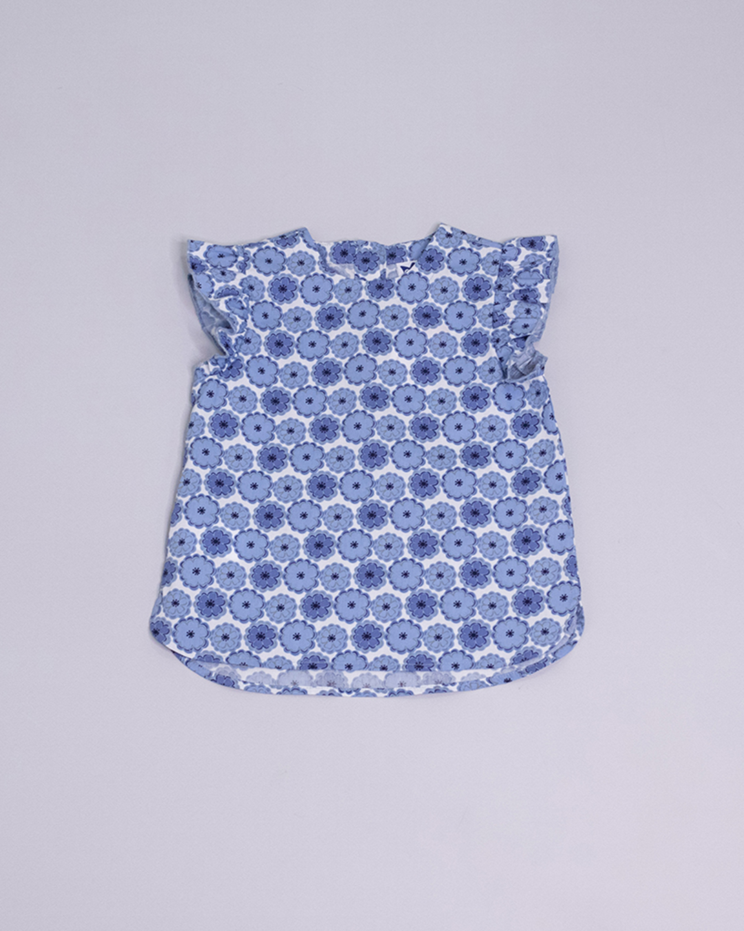 Blusa sin mangas con estampado de flores azules y blancas