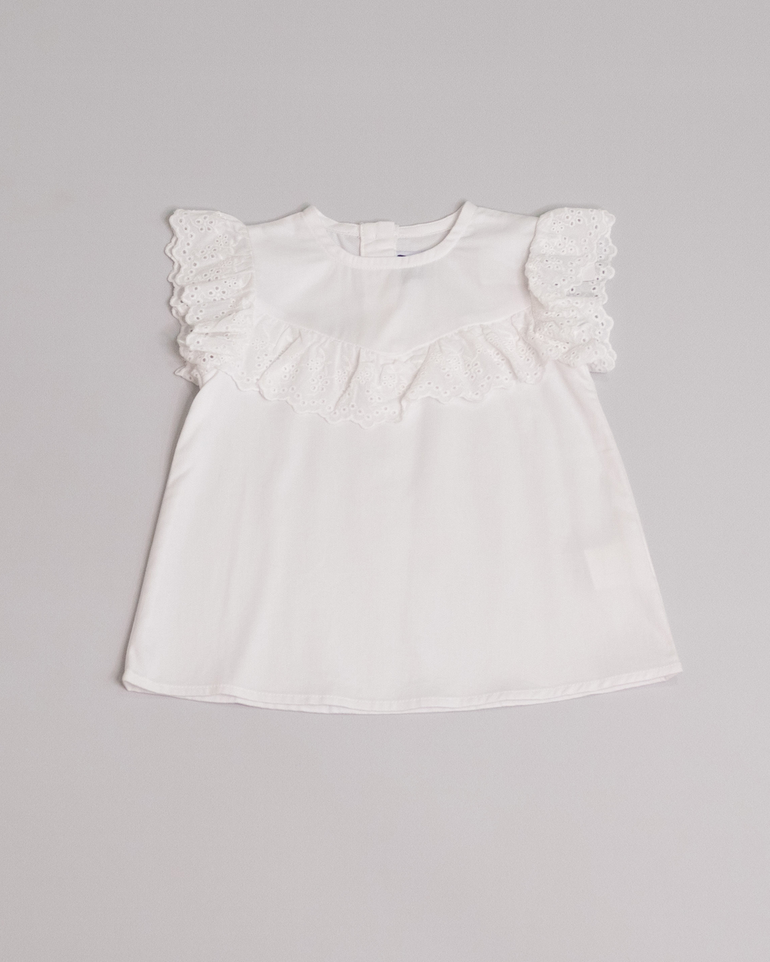 Franela sin mangas blanca con eyelet