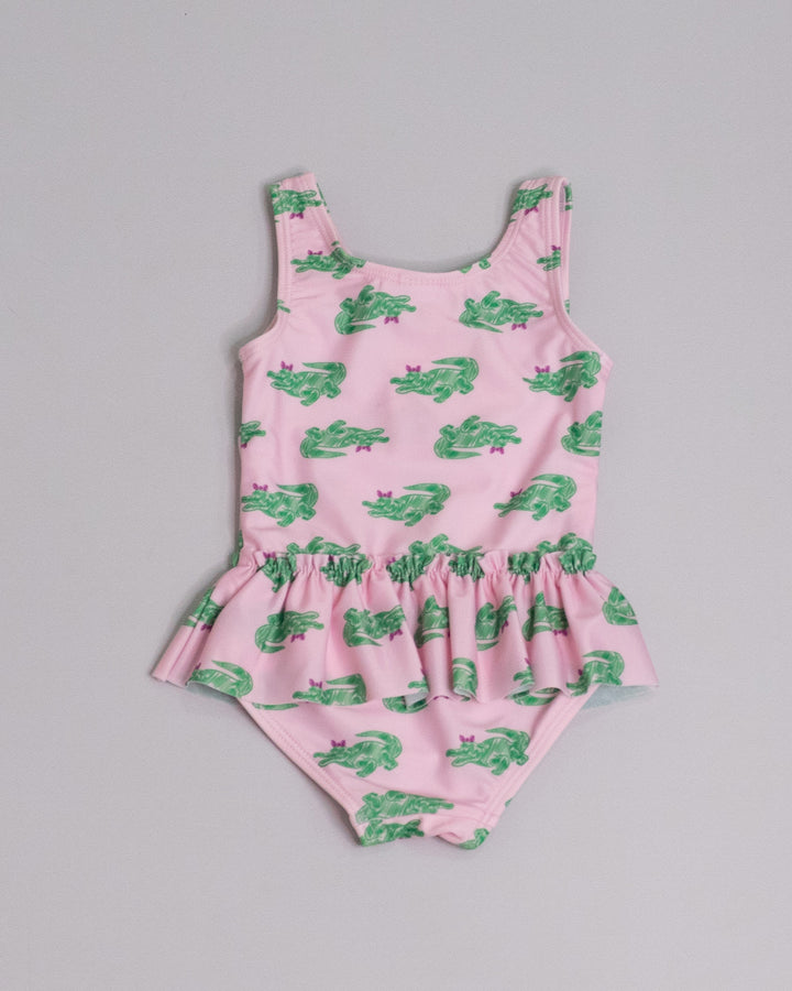 Traje de baño rosado con estampado de cocodrilos verdes para Bebé Niña