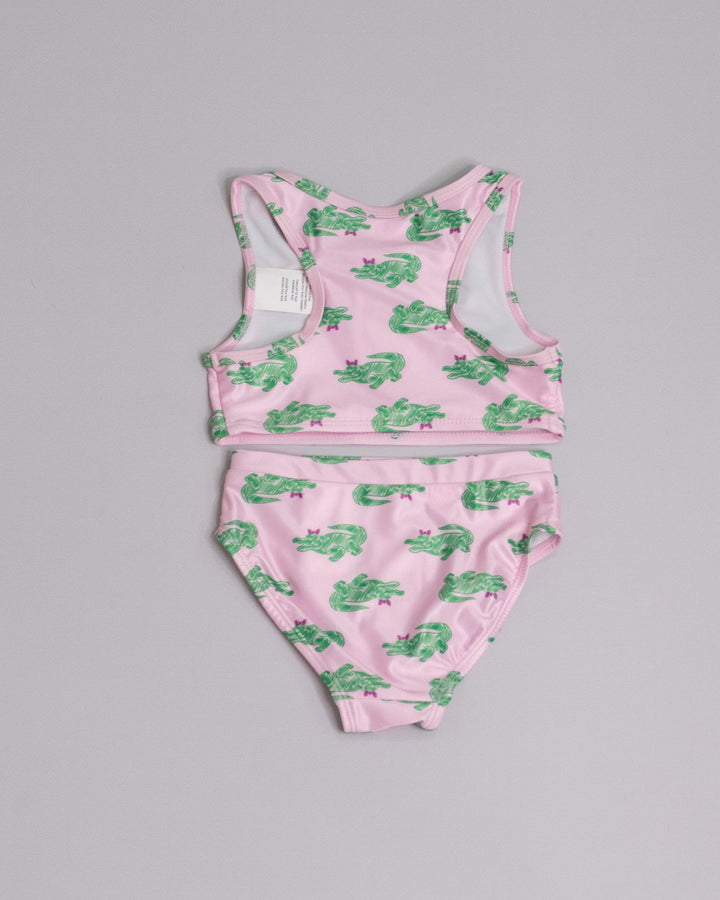 Traje de baño rosado con estampado de cocodrilos verdes para Niña