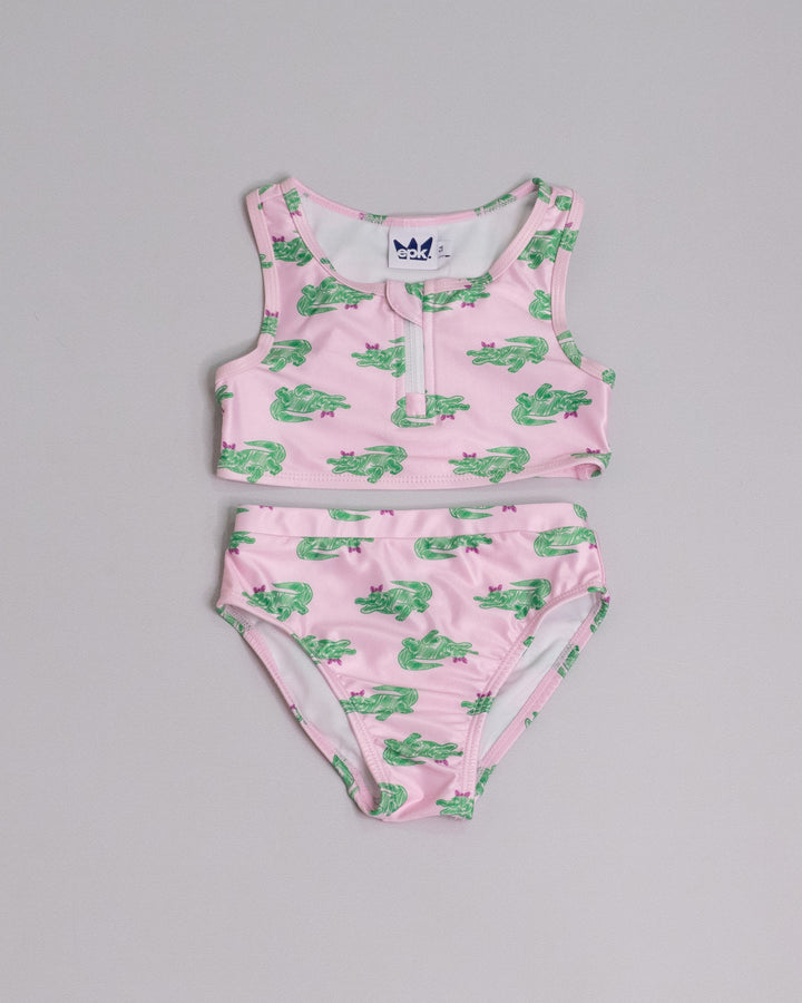Traje de baño rosado con estampado de cocodrilos verdes para Niña
