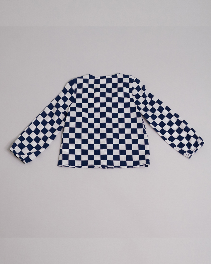 Blusa manga larga con estampado de cuadros blancos y azules
