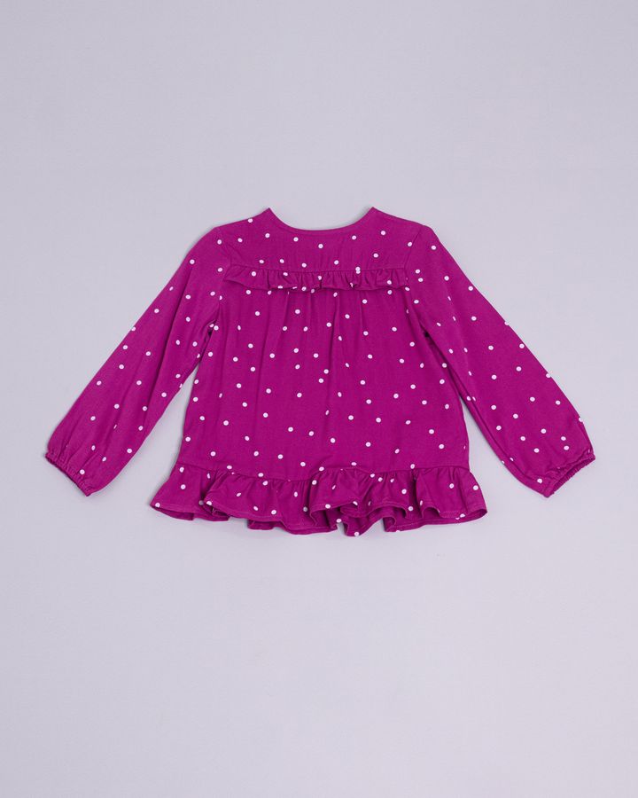 Blusa manga larga de color magenta y puntos blancos