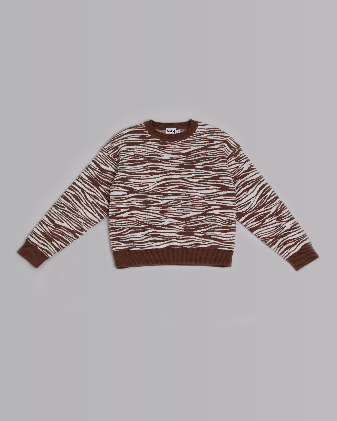 Suéter con estampado de zebra marrón y crema