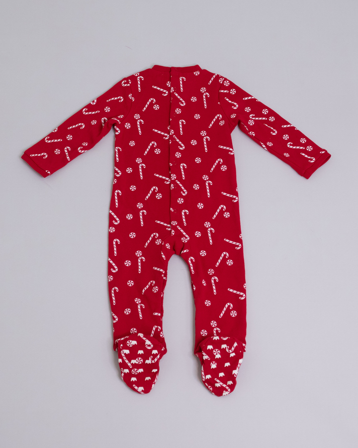 Pijama roja con estampado blanco y cara de Santa