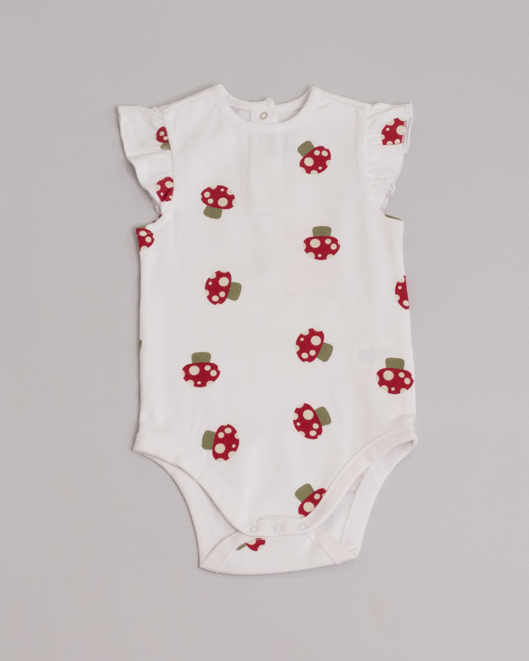 Body sin mangas blanco con estampado de honguitos