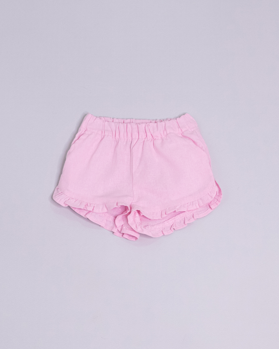 Short rosado con volantes