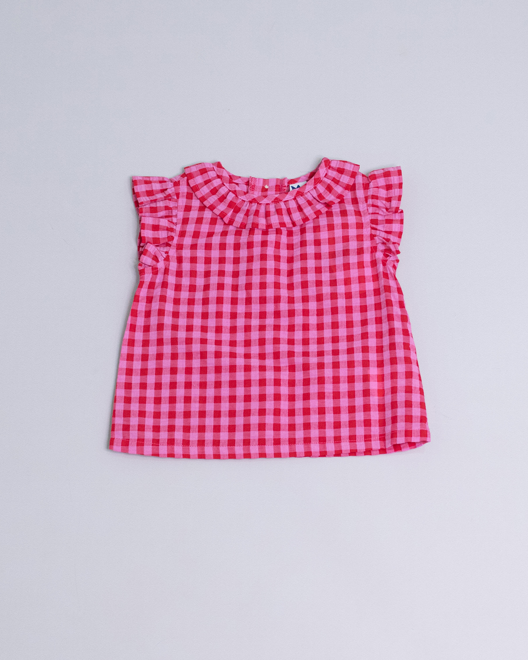 Blusa sin mangas de cuadros rojos y rosados
