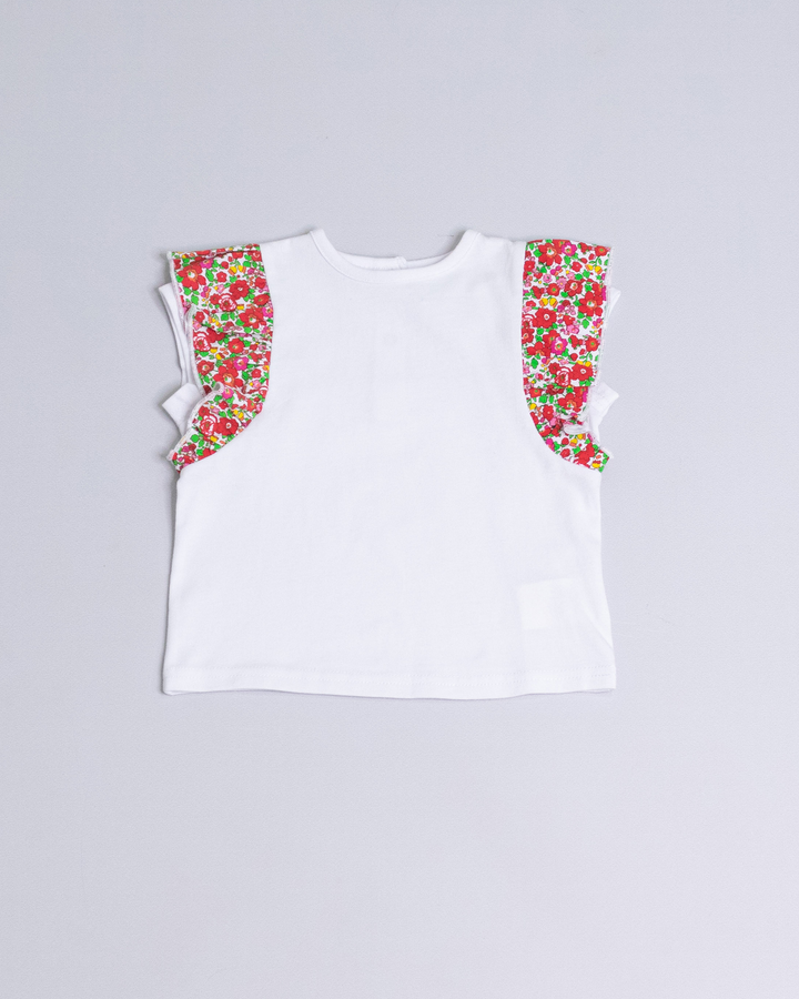 Franela blanca con volantes estampados de flores multicolor