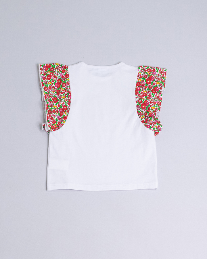 Franela blanca con volantes estampados de flores