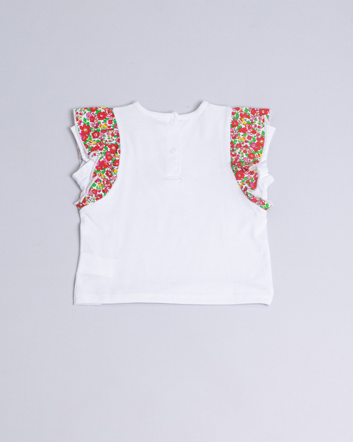 Franela blanca con volantes estampados de flores multicolor