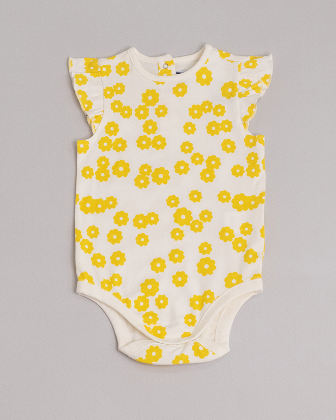 Body color crema con estampado de flores mostaza