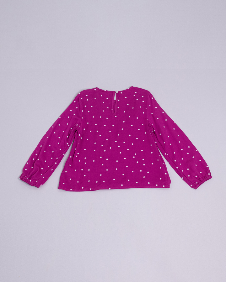 Blusa manga larga de color magenta y puntos blancos