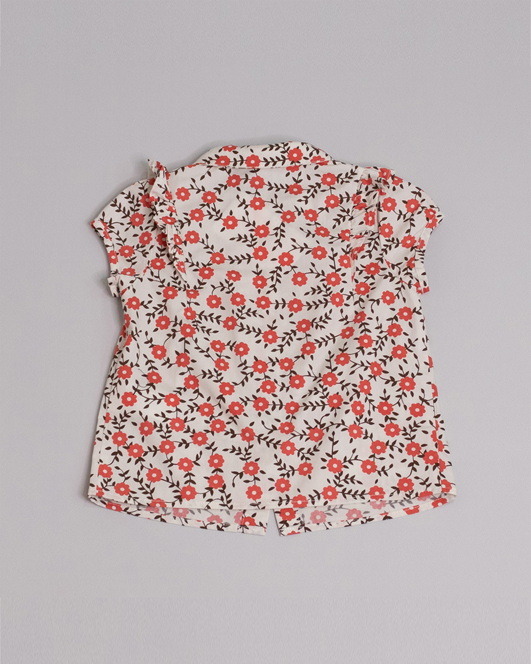 Blusa manga corta de popelina color crema con estampado de flores