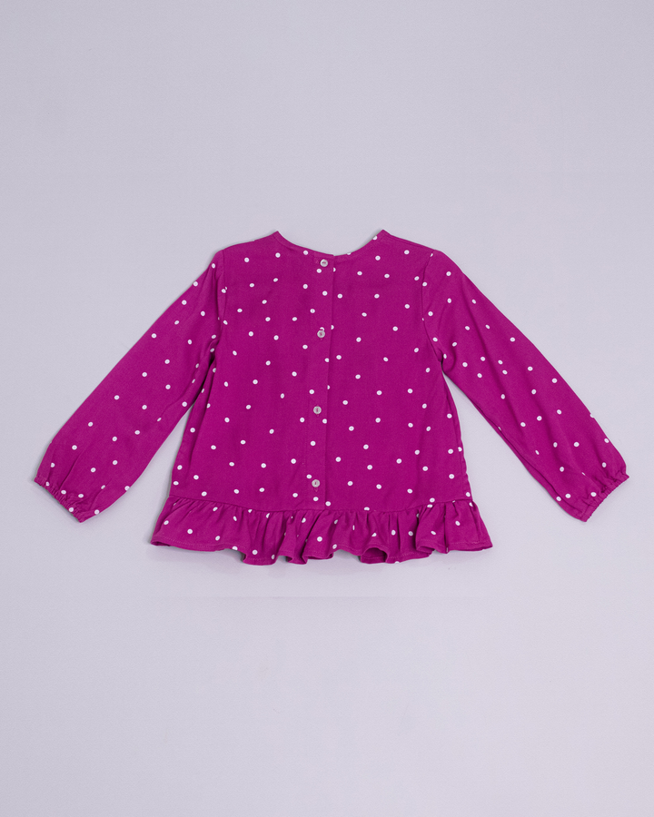 Blusa manga larga de color magenta y puntos blancos