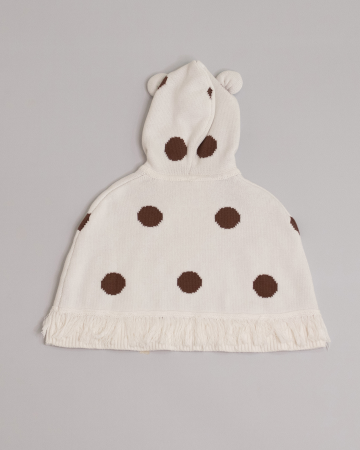Poncho crema con círculos marrones