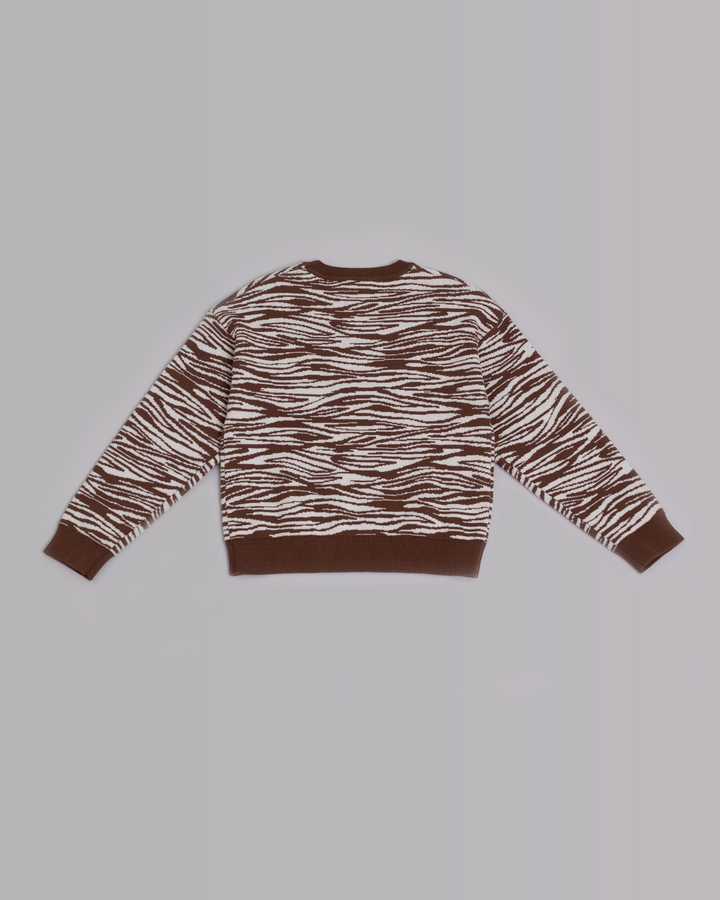 Suéter con estampado de zebra marrón y crema