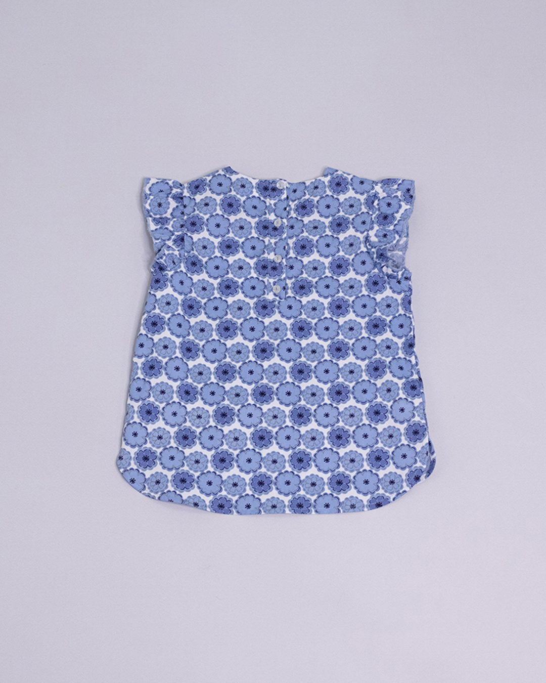 Blusa sin mangas con estampado de flores azules y blancas