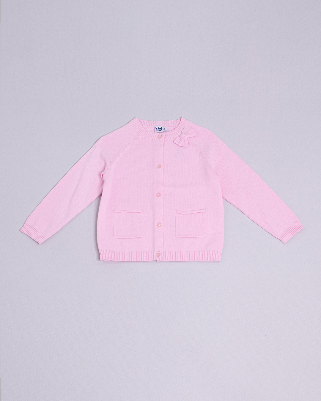 Cardigan rosado con bolsillos