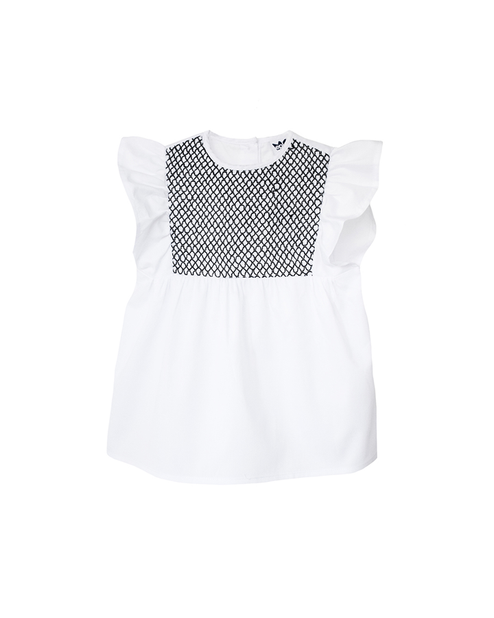 Blusa blanca con nido de abeja azul marino