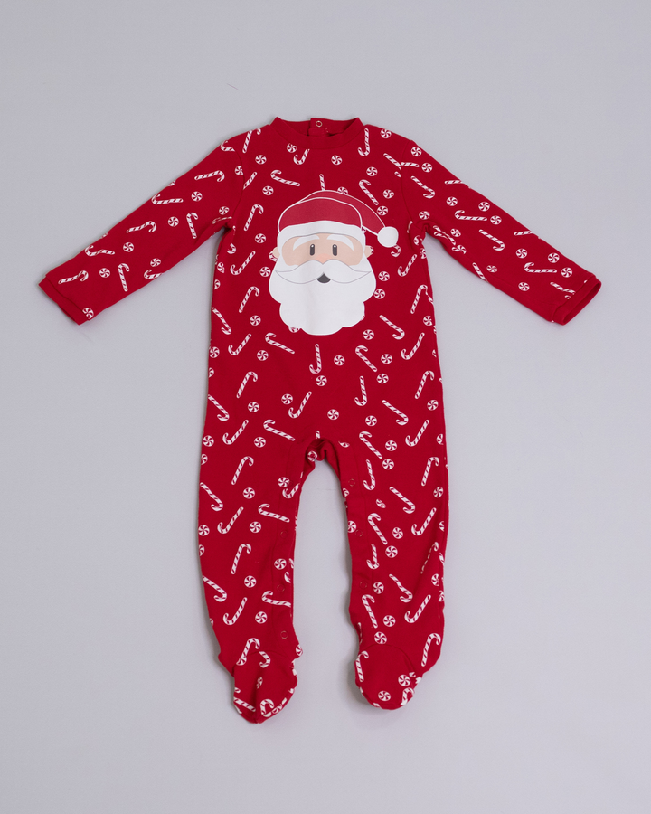Pijama roja con estampado blanco y cara de Santa