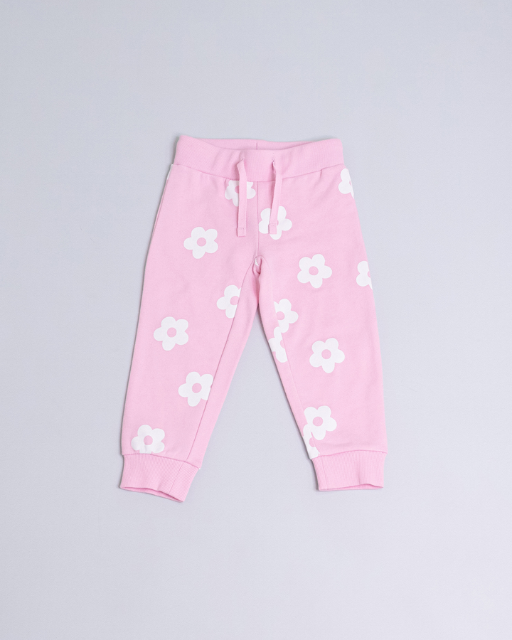 Jogging rosado con flores blancas